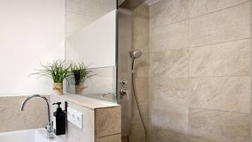 Shower, free toiletries, hair dryer, towels