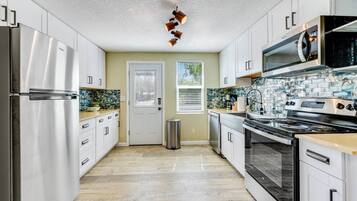 Fridge, microwave, dishwasher, coffee/tea maker