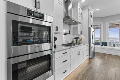 Spacious riverfront home perfect for larger families, featuring stunning river views, private dock