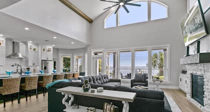 Spacious riverfront home perfect for larger families, featuring stunning river views, private dock