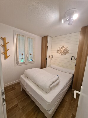 2 habitaciones, cuna de viaje, wifi gratis y ropa de cama 