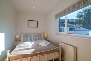 4 bedrooms, iron/ironing board, travel cot, WiFi