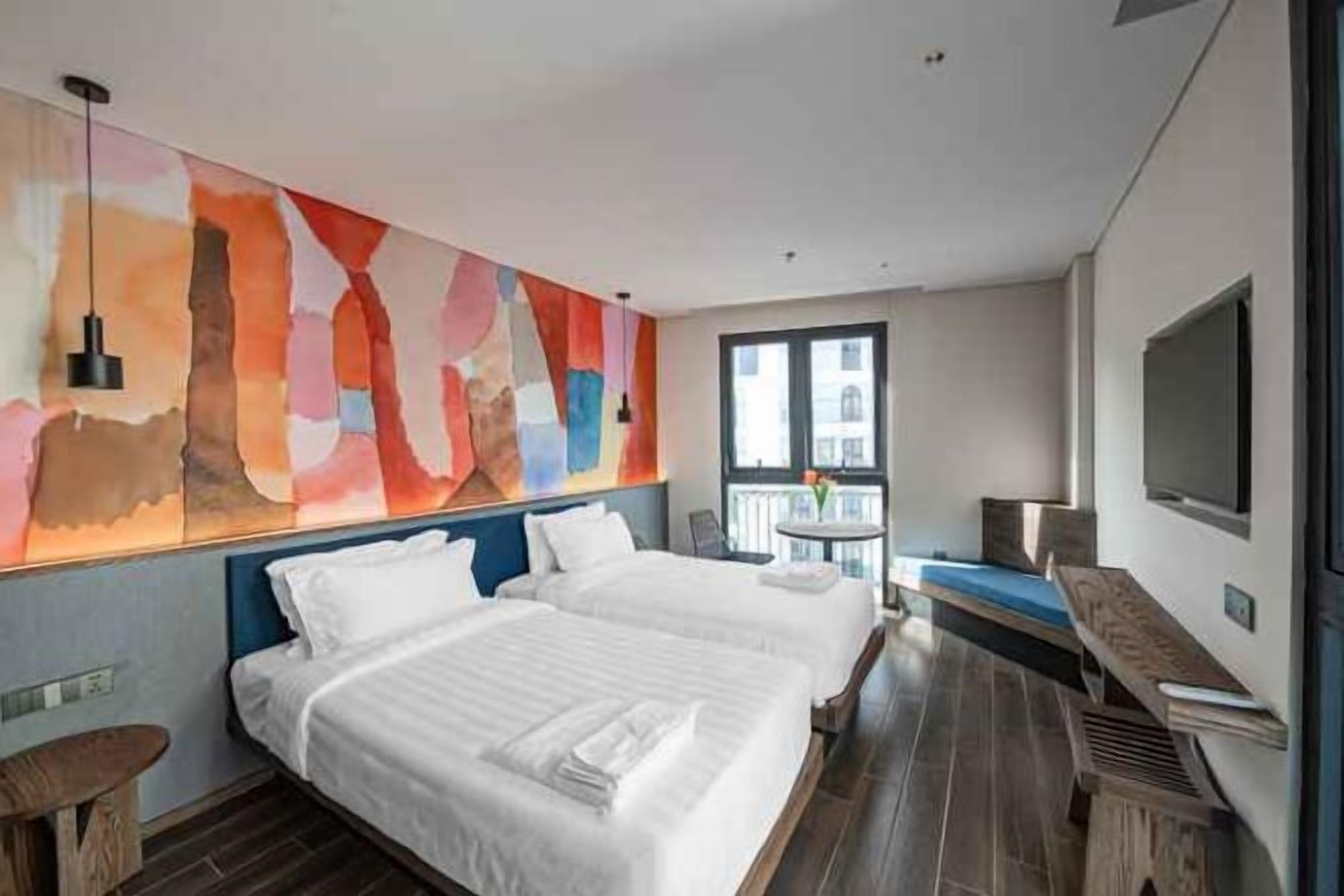 Premium bedding, down comforters, memory foam beds, in-room safe