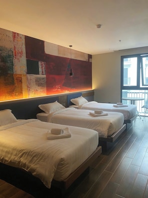 Premium bedding, down duvets, memory-foam beds, in-room safe - TK Phu Quoc Hotel - Grand World Phu Quoc (Phu Quoc)