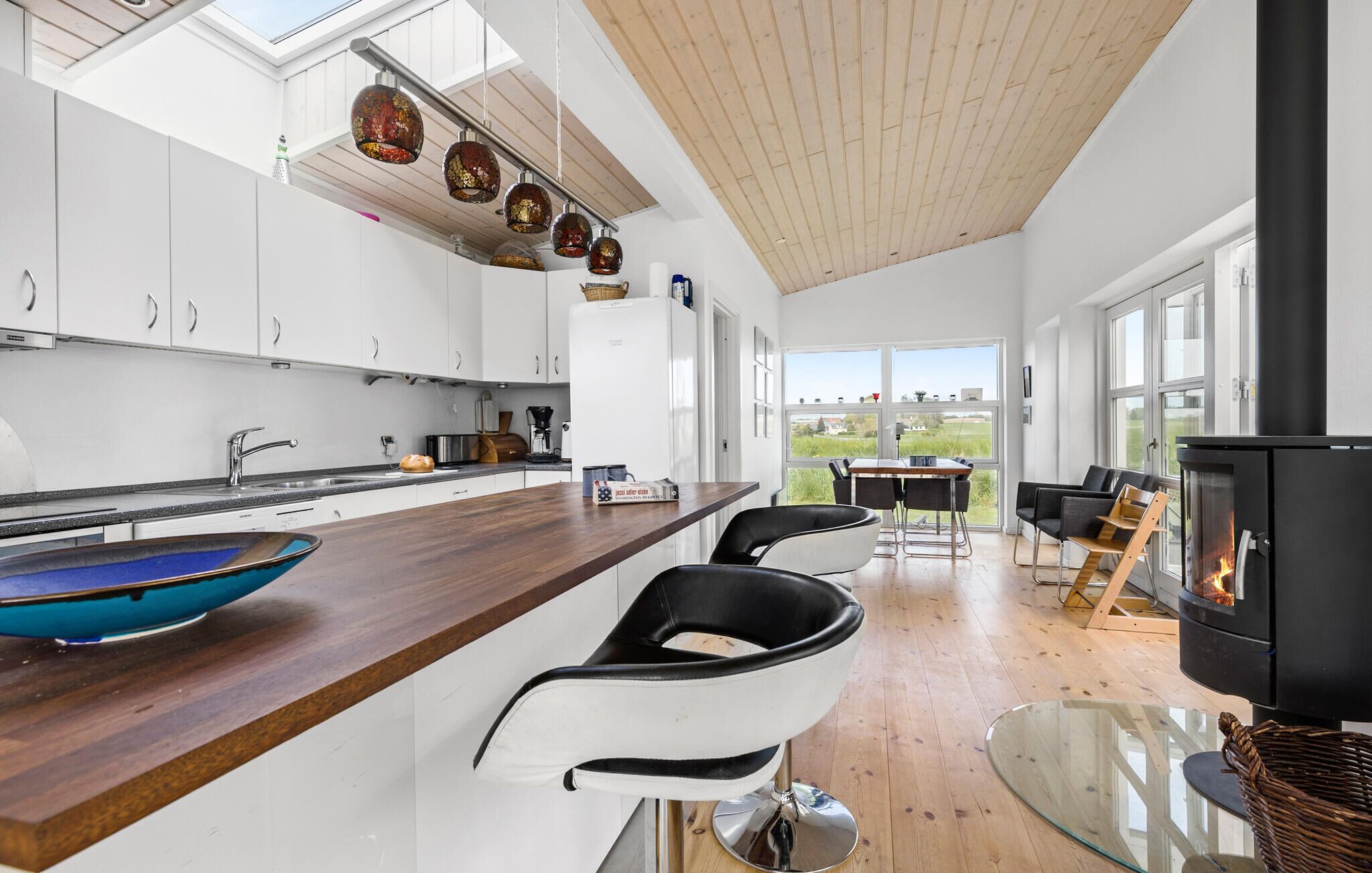 Fridge, stovetop, dishwasher, coffee/tea maker