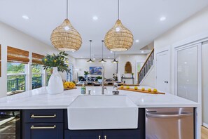 Fridge, microwave, oven, stovetop - Spacious 4BR with direct Guadalupe River access, private hot tub, decks, and games. Sleeps 11 and perfect for families, friends, or groups seeking fun and relaxation. (New Braunfels)