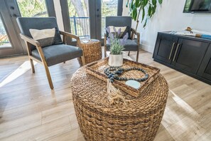 Interior - Discover modern riverfront luxury at The White House. Enjoy a sleek designer kitchen, a tranquil master suite, and an expansive deck with breathtaking views of the Guadalupe River. Experience the perfect blend of hotel-quality service and the privacy (New Braunfels)