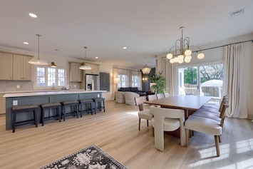 Open concept kitchen, dining room and living room