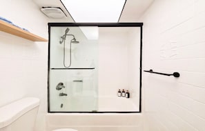 Shower, hair dryer, towels, soap