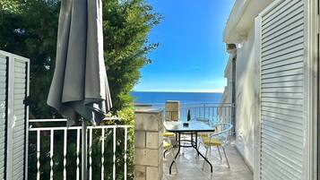 Family Apartment, Partial Sea View | Teres/patio