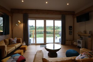 Fireplace - Luxury Hand Built Cedar Cabin in Oakhill (Radstock)