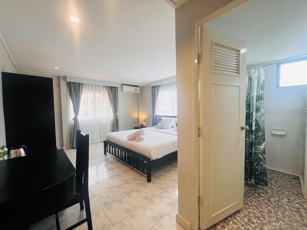 Superior kamer, 1 twee- of 2 eenpersoonsbedden | Een kluis op de kamer, individueel gemeubileerd, gratis wifi, beddengoed