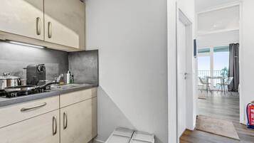Fridge, stovetop, coffee/tea maker, toaster