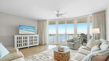 Signature Condo, 2 Bedrooms, Balcony, Beach View | Living room | 55-inch Smart TV with cable channels, table tennis
