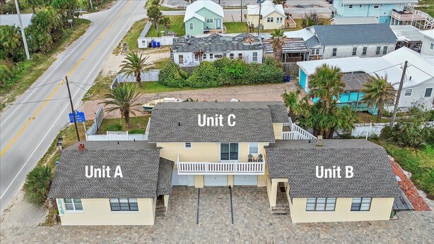 A residential area with three labeled units (A, B, C) and a road. - Anchors Aweigh Apartment, Steps to Vilano Beach (St. Augustine)