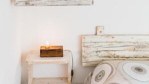 A rustic, white-framed mirror with a distressed finish on a white wall. - BIO AGRITURISMO SALOS (Otranto)