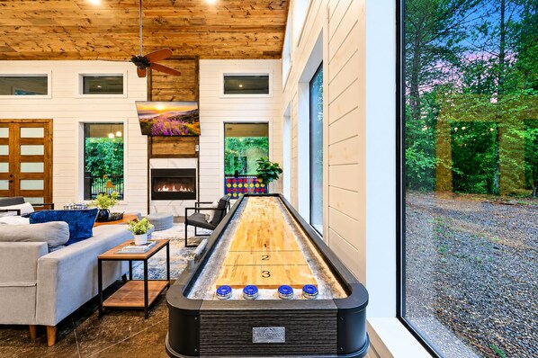 Shuffleboard + board games for family fun indoors