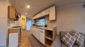 Cabin | Private kitchen | Fridge, microwave, oven, stovetop - Caravan at Newquay Bay Resort - 3 Bedrooms (Newquay)