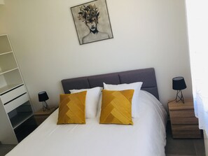 2 habitaciones, tabla de planchar con plancha, wifi y ropa de cama 