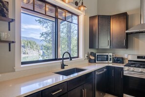 Fridge, microwave, oven, stovetop - Middle Fork Retreat - a 3 bedroom home near Glacier National Park! (Hungry Horse)