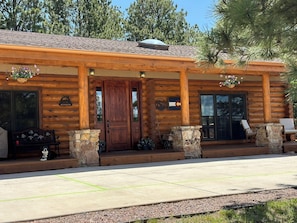 Terrace/patio - Log Home Retreat! Hot Tub, Game Room, Gym, Close To USAFA, & Spruce Mtn Ranch. (Monument)