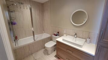 Hair dryer, towels, soap, shampoo
