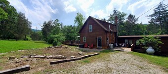 Quiet, country 2 bedroom, 1 bath cabin with 2 optional attached guest apartments
