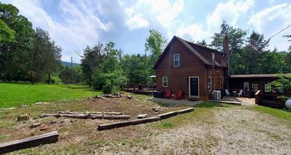 Quiet, country 2 bedroom, 1 bath cabin with 2 optional attached guest apartments