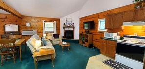 TV, fireplace - Romantic, country cabin for two with oversize jetted tub (Holiday Island)