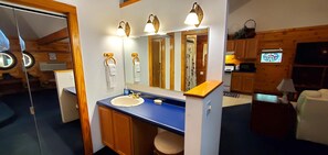 Shower, jetted bath, towels