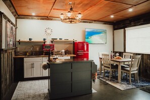 Fridge, microwave, stovetop, coffee/tea maker