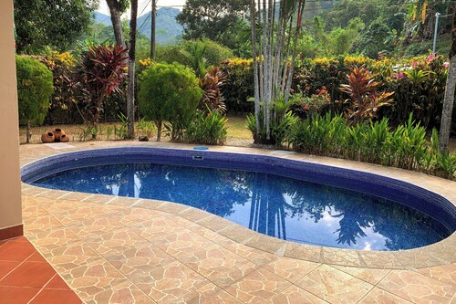10 minutes to the beach!  Private home with lush jungle surroundings & pool.