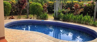 10 minutes to the beach!  Private home with lush jungle surroundings & pool.