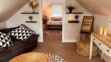 Smart TV, fireplace, books, printers