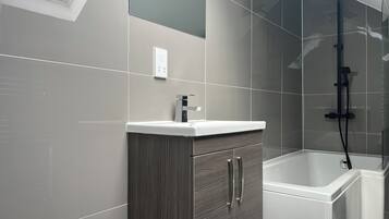 Eco-friendly toiletries, hair dryer, towels, soap