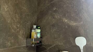 Jetted tub, hair dryer, towels, soap