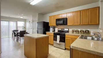 Fridge, stovetop, cookware/dishes/utensils