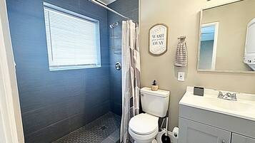 Hair dryer, towels, soap, toilet paper