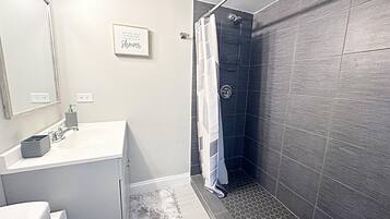 Hair dryer, towels, soap, toilet paper