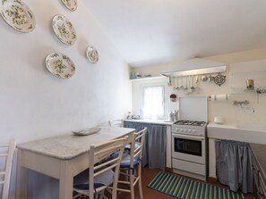Fridge, oven, cookware/dishes/utensils