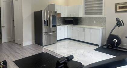 High ceiling two bed room basement apartment almost at ground level.