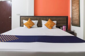 Deluxe driepersoonskamer | Geluiddichte muren, gratis wifi, beddengoed