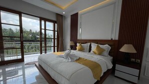 ห้องดีลักซ์ | โต๊ะทำงาน, ผ้าปูที่นอน