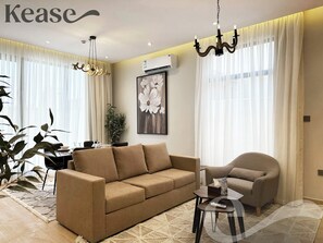 Design Apartment, 2 Bedrooms | Living area | Flat-screen TV - Kease Yasmin 4-13 Ramz Terrace AG74 (Riyadh)