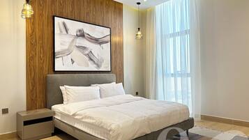 Design Apartment, 2 Bedrooms | 2 bedrooms, blackout drapes, iron/ironing board, free WiFi