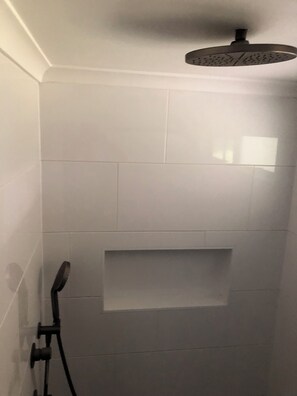 Shower, towels, soap, shampoo