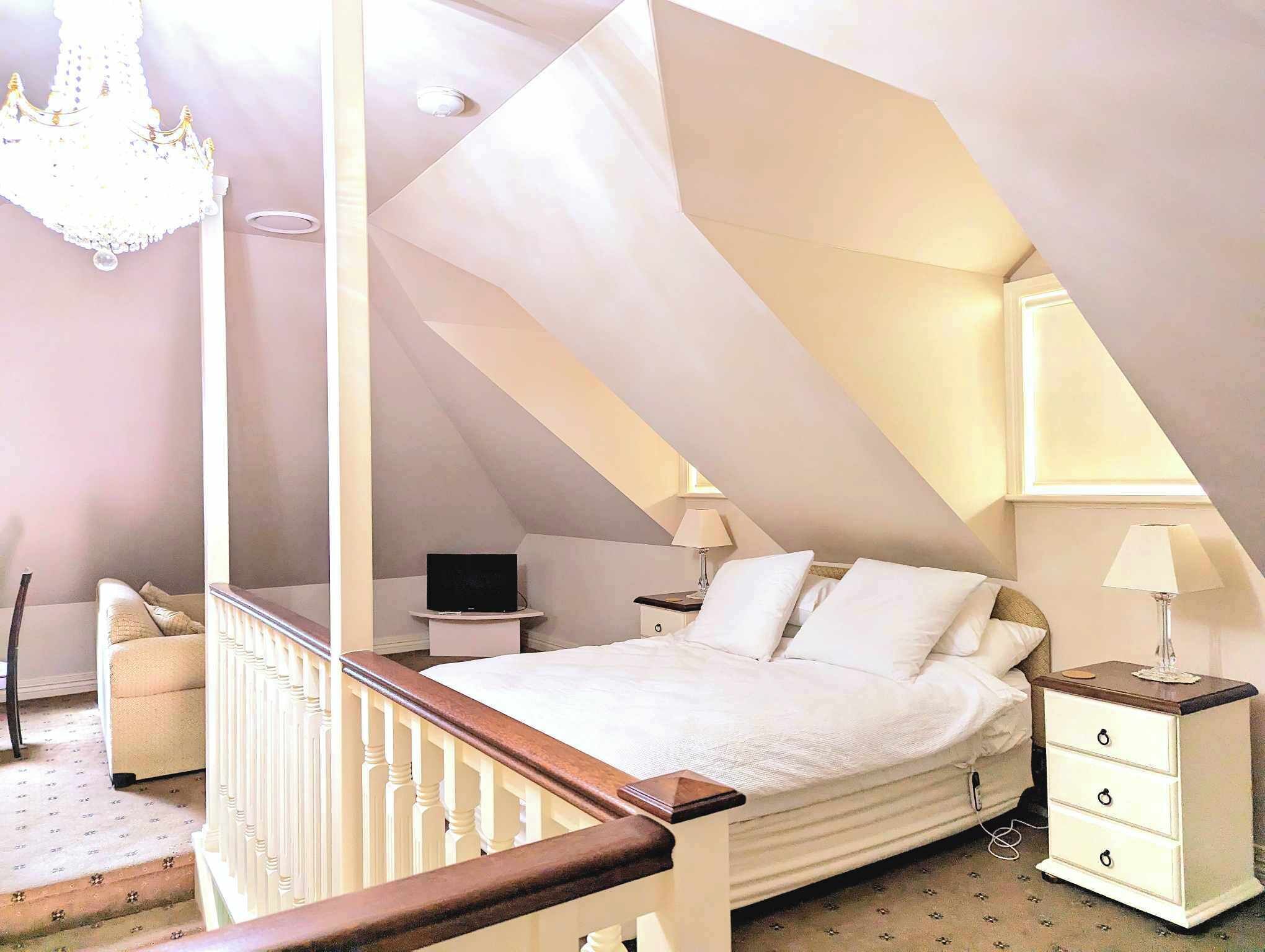 The Loft - Upstairs | Premium bedding, down comforters, laptop workspace, free WiFi