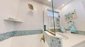 Shower, hair dryer, towels