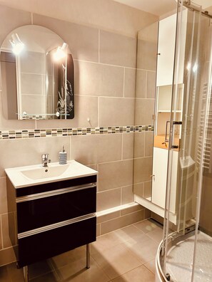 Shower, hair dryer, soap, shampoo