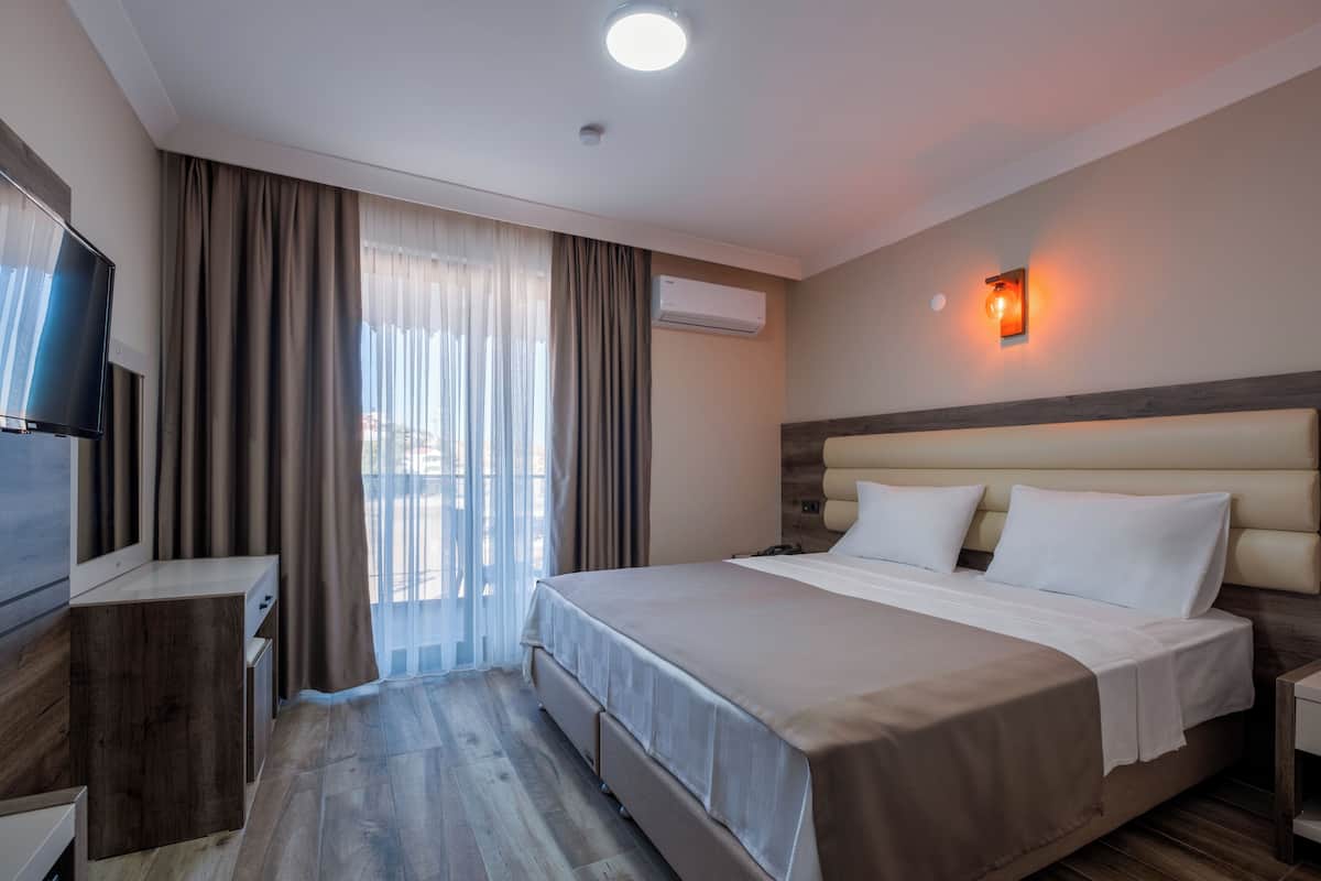 Standaard kamer | 1 slaapkamer, een minibar, verduisterende gordijnen, geluiddichte muren